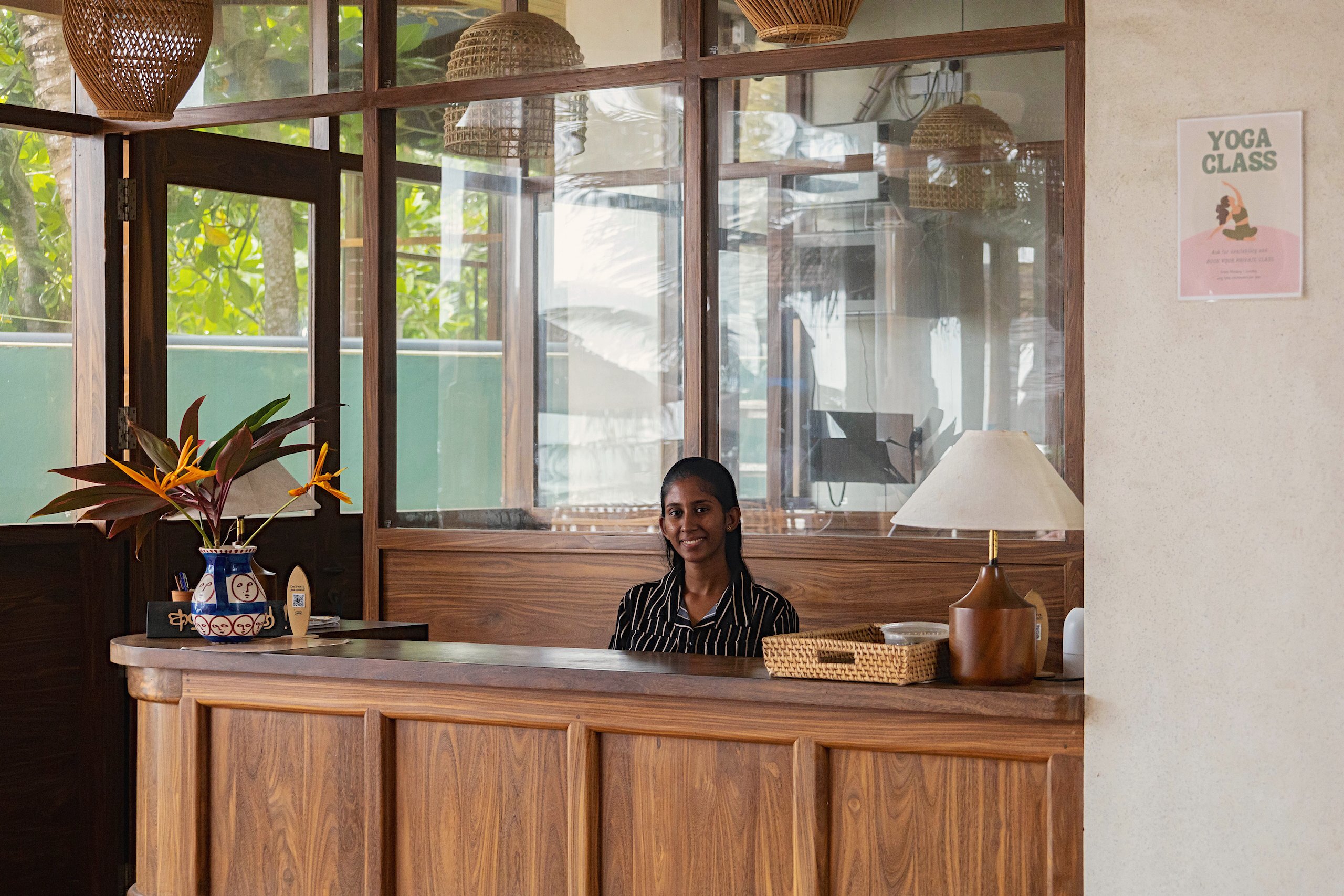 A smiling welcome at the reception desk